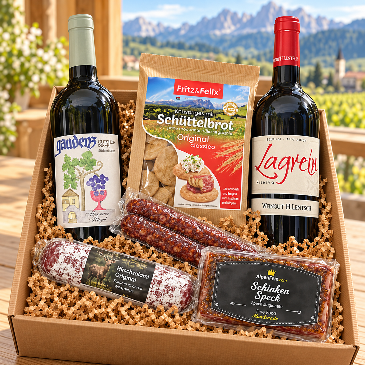 Box regalo vino “Momenti di vino altoatesini” – Vernatsch, Lagrein Riserva, speck e salame di cervo